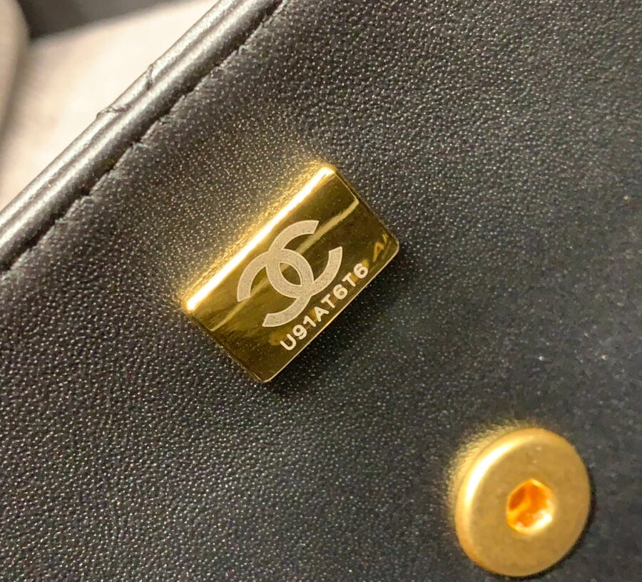 Designer Top Handle gold bag – front view